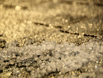 After a hail storm, know how to spot the signs of damage to your roof. ©iStockphoto.com/BrandonKauffman